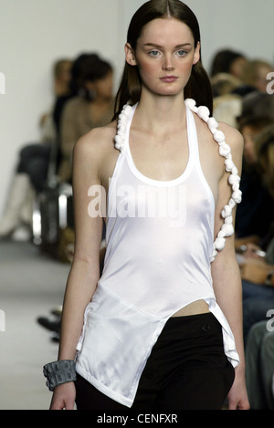 Helmut Lang Ready to Wear Paris spring summer Menswear fashion show Model  long dark hair wearing black top black leather Stock Photo - Alamy