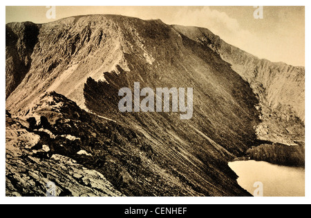 Helvellyn Ridge Lake District England Striding Edge scrambling route Birkhouse Moor arête Red Tarn lake UK Stock Photo