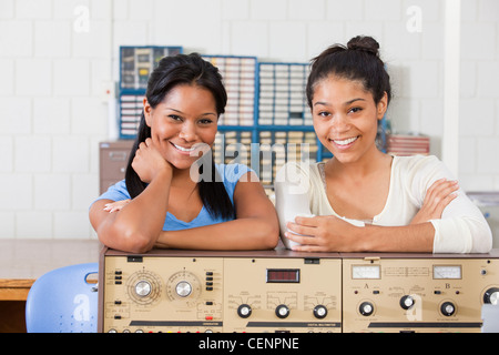 Engineering students using bench test equipment in a lab Stock Photo