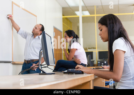 Engineering students studying in a lab Stock Photo