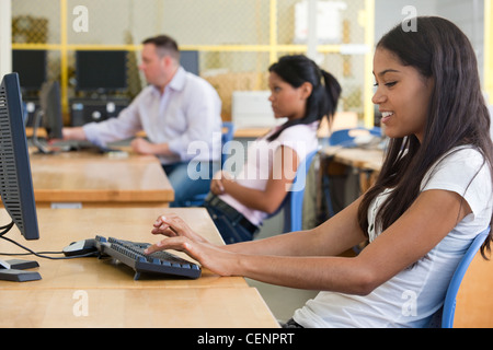 Engineering students using computers in a lab Stock Photo