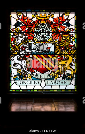 The Manchester coat of arms made in a stained glass window in the University's Sackville Street Building (Editorial use only). Stock Photo