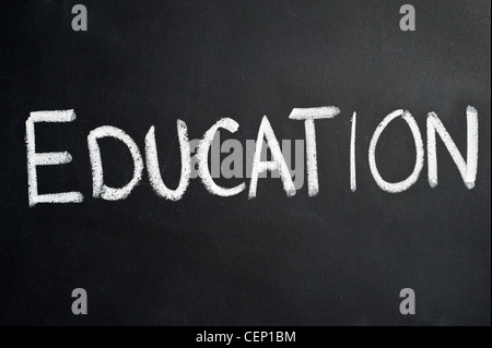 Blackboard with the word EDUCATION written on it in white chalk Stock Photo