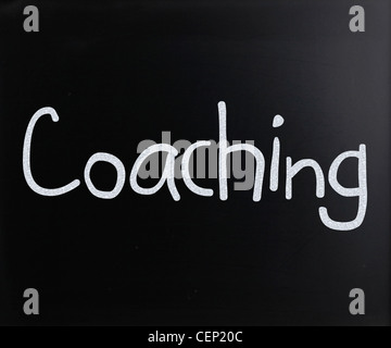 Text handwritten with white chalk on a blackboard Stock Photo