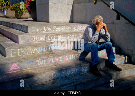 Chalked Occupy Wall Street statements and opinions decorate the steps of Los Angeles City Hall in October, 2011. Stock Photo