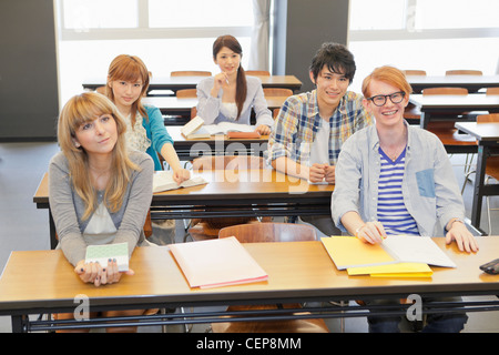 University students studying in classroom Stock Photo