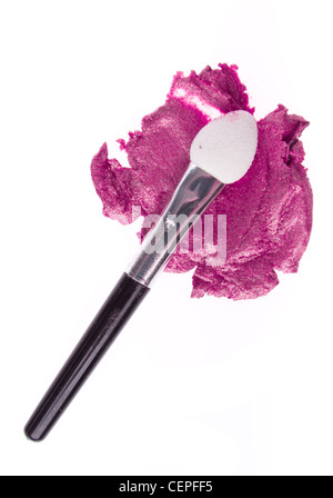 cream eyeshadow with brush isolated on white background Stock Photo