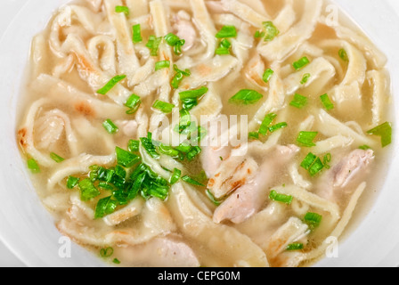 Chicken noodle soup isolated on a white Stock Photo