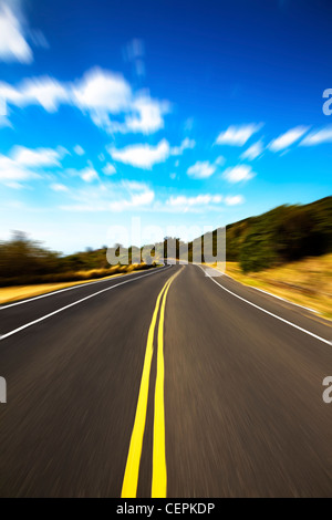 High speed road pass through the jugle with cloud background Stock Photo