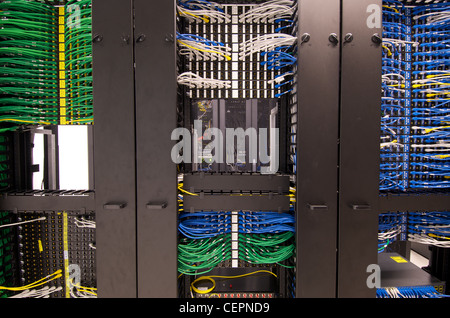 Ethernet cables and sockets neatly arranged in the server racks of a data center at some Hong Kong serviced offices. Stock Photo