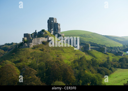The ruins of the 11th century Corfe Castle in the Purbeck Hills. Stock Photo