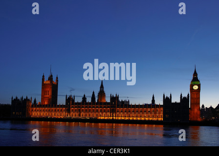 Houses of Parliament at night viewed from the South Bank. Stock Photo