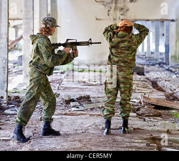 Women in war - the capture of a prisoner Stock Photo