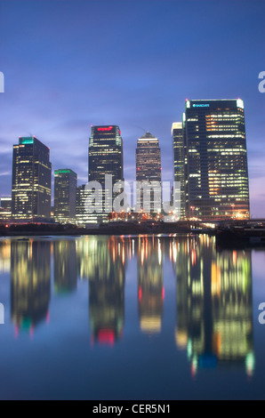Canary Wharf reflected in the River Thames. Stock Photo