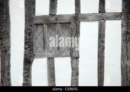 The Tudor beamed facia of a house in the Suffolk village of Lavenham. Stock Photo
