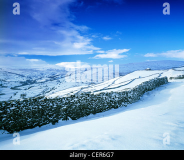 Snow covered fields and dry stone walls in Swaledale near Gunnerside. Stock Photo