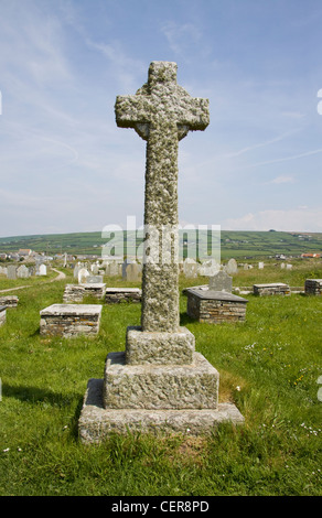 A stone cross in a churchyard near Tintagel. Stock Photo