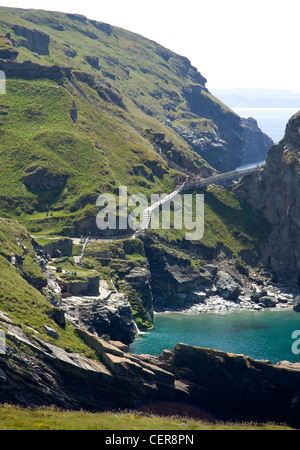 Footpath steps and bridge leading to Tintagel Head, the site of Tintagel Castle associated with the legend of King Arthur. Stock Photo