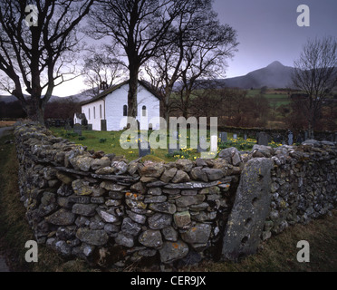 Tiny Newlands Church nestles in the Newlands Valley near the hamlet of Little Town. Causey Pike can be seen in the background. Stock Photo