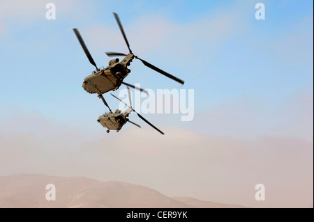 RAF Chinook helicopters on maneuvers in Moroccan desert, training for deployment to Afghanistan. Stock Photo