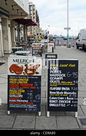 Melrose fish restaurant menus outside on the pavement Brighton seafront UK Stock Photo