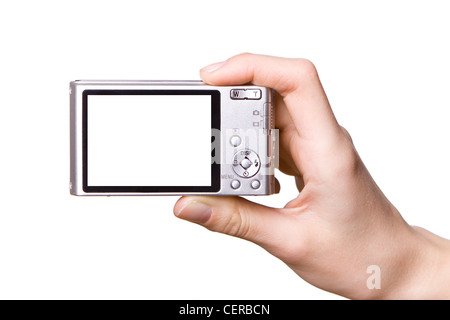 The digital camera in a hand, isolated on white Stock Photo