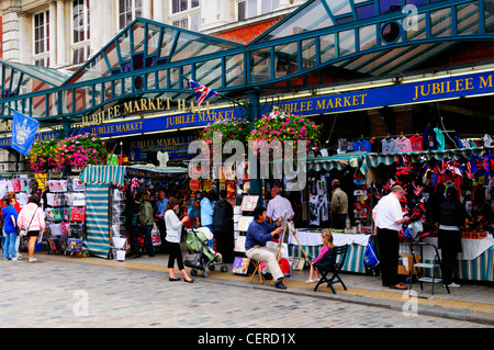 People shopping in Jubilee Hall Market on the south side of the piazza in Covent Garden. Stock Photo