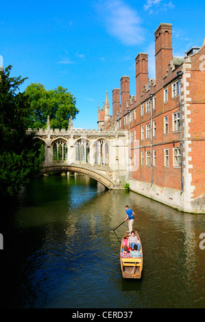 Punting on the River Cam by The Bridge of Sighs at St John's College. Stock Photo