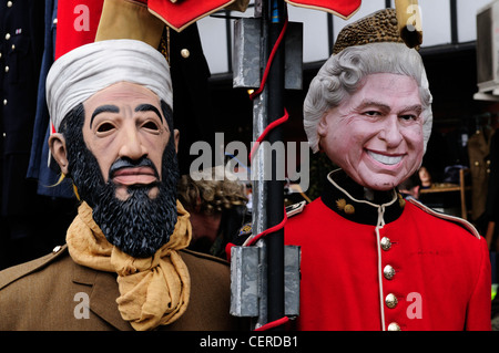 Mannequins dressed as Osama bin Laden and The Queen on a stall in Portobello Road Market. Stock Photo
