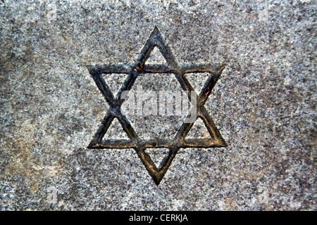 A Star of David symbol on a granite headstone at Oak Hill Cemetery located in Georgetown Washington DC Stock Photo