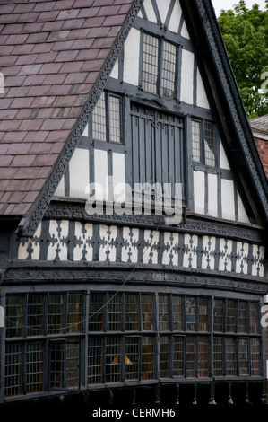 Tudor style black and white buildings in the Roman City of Chester with leaded windows Stock Photo