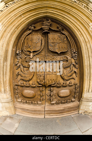 The Great West door of Bath Abbey carved with the Montague heraldic family arms. Stock Photo
