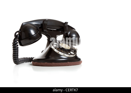1930's or 1940's Vintage Black Telephone on White Stock Photo
