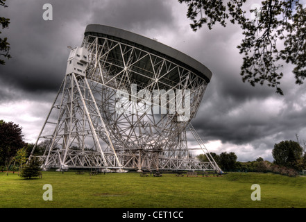 Jodrell Bank’s Lovell Telescope beneath storm clouds as the historic Cheshire observatory faces the loss of science funding., Holmes Chapel, Cheshire Stock Photo