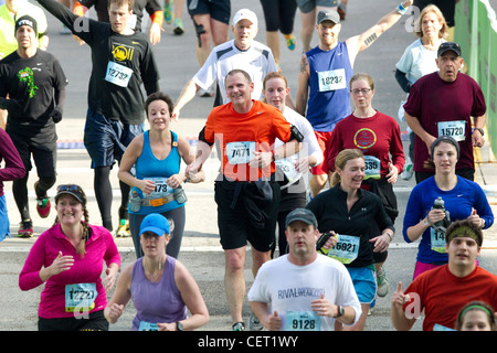 More than 18,000 runners athletes pounded the streets of downtown Austin for the 22nd annual Austin Marathon Stock Photo