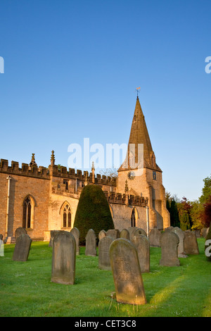 First light over the parish church of St Anne in Baslow. The clock face has VICTORIA 1897 in the place of numbers in commemorati Stock Photo