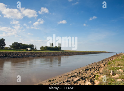 The River Nene flowing out to sea near Sutton Bridge. Stock Photo