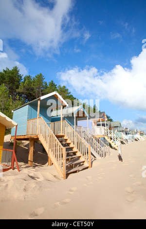 Colourful beach huts along the seafront at Wells-next-the-Sea. Stock Photo