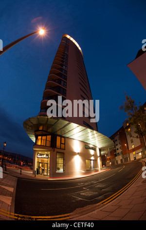 UK, Wales, Swansea, Maritime Quarter, Meridian Tower, entrance to Grape and Olive restaurant at night Stock Photo