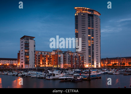 UK, Wales, Swansea, Maritime Quarter, Meridian Tower, towering over the Marina at night Stock Photo