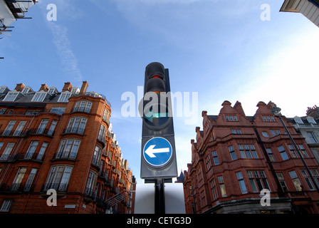 Green traffic lights in Mayfair. In 1868 the first traffic lights were installed outside the Houses of Parliament by the railway Stock Photo