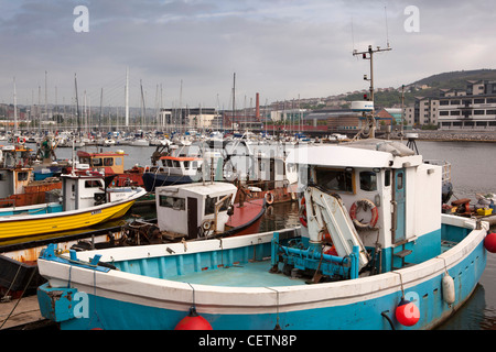 UK, Wales, Swansea, Maritime Quarter, fishing boats moored on River Tawe below sailbridge Stock Photo