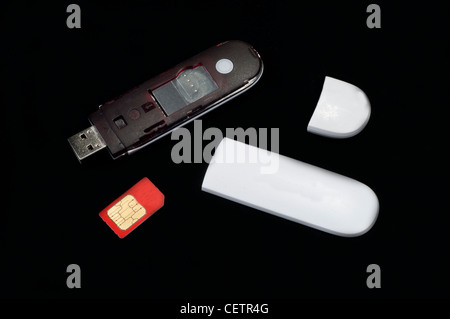 3g mobile moden and sim card  parts on isolated black background Stock Photo