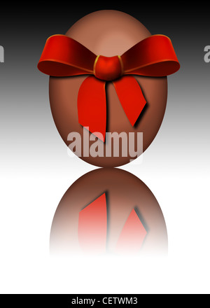 Chocolate Easter egg wrapped in red bow Stock Photo