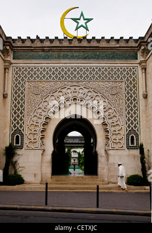 A worshipper enters the Muslim Institute Paris Mosque Stock Photo