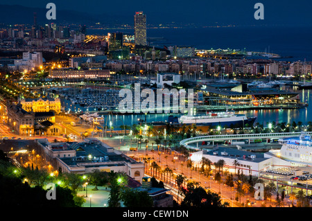 Panoramic view at night from Montjuic over Port Vell, Barcelona, Catalonia, Spain