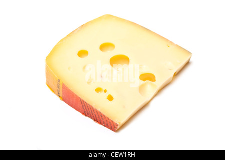 Norwegian Jarlsberg cheese wedge isolated on a white studio background. Stock Photo