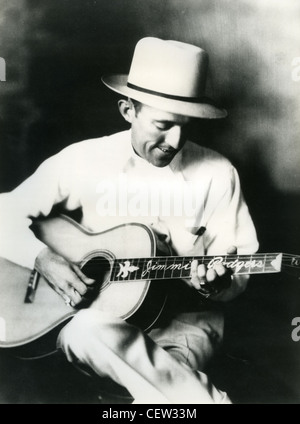 JIMMIE RODGERS (18971933) US Country musician collects his new car