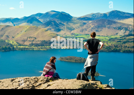 Walkers on Walla Crag above Derwent Water in the English Lake District, looking towards the north-western fells Stock Photo