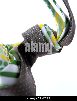 Patterned necktie / tie fabric knot close up on white background Stock Photo
